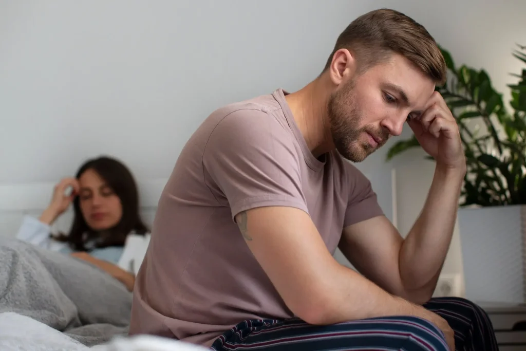 Man experiencing stress related to premature ejaculation symptoms in Birmingham